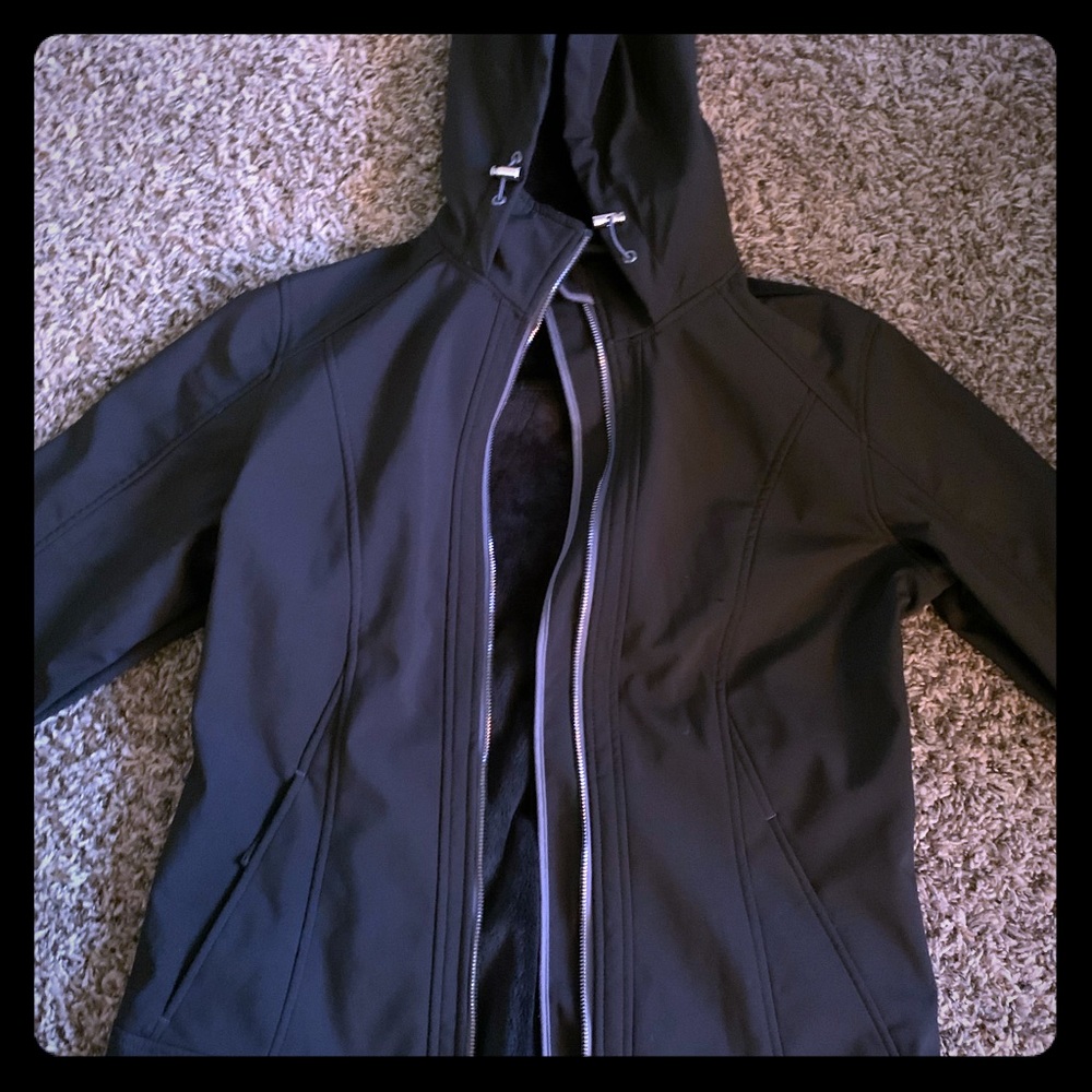 A black rain jacket